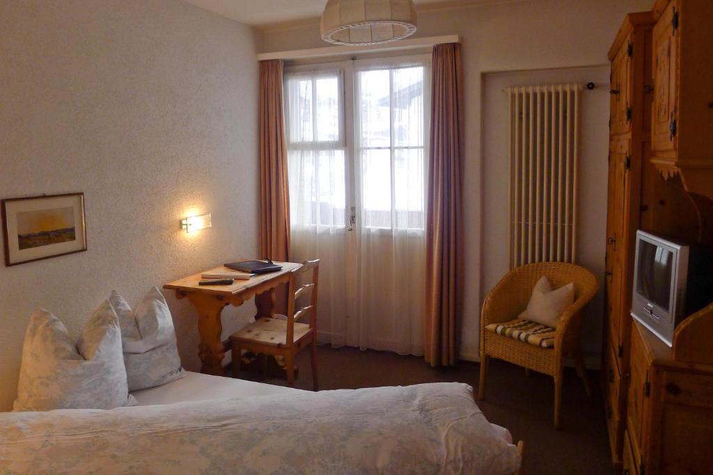 Hotel Romana Savognin Pokoj fotografie